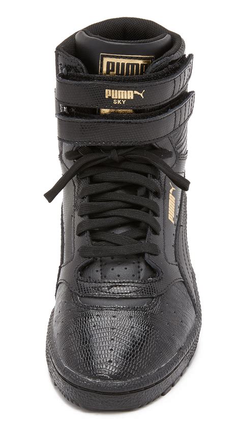 black puma high top sneakers.